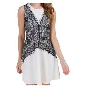 Francesca's white and black dress with lace. XS